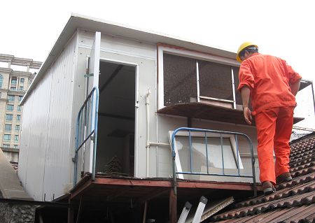 [动态]"内环限鸽"后首拆违章鸽棚