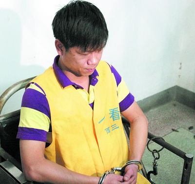 犯罪嫌疑人徐小明.余志雄摄