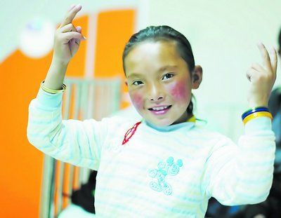 可爱的巴桑卓玛现在最大的心愿,便是能够在长沙解决自己的"心"病.