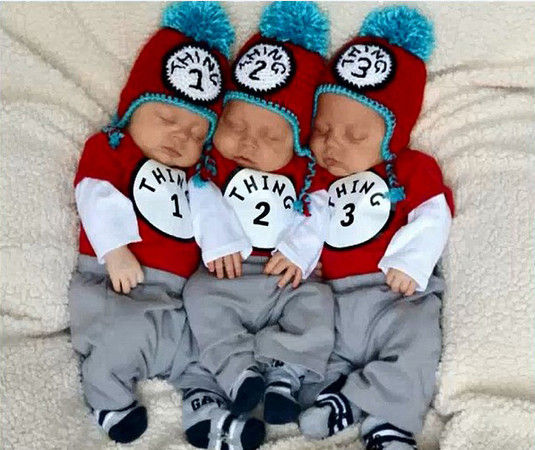 三胞胎婴儿罹患罕见眼球癌 父母坚不弃治疗(图)