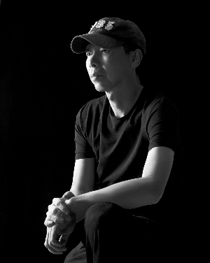 导演回应质疑 冯小刚:"地震"检验观众善良