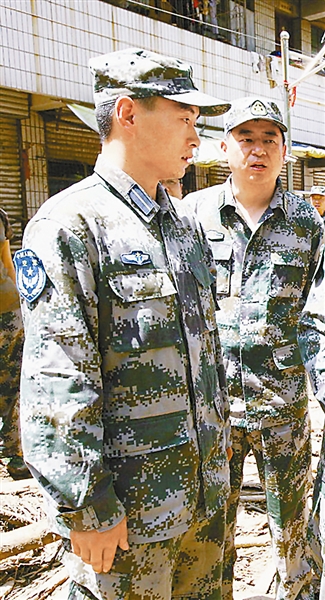 回望家乡,有一种坚强在心底 ■本报记者 梁蓬飞 特约记者 蔡瑞金