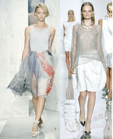 可惜灰蒙蒙的透视纱织和一抹怪异的朱红墨色重叠,活脱脱像一把丢弃了