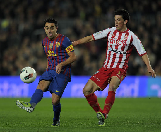 图文-[西甲]巴塞罗那3-1希洪 哈维起脚传球_国际足球-西班牙_新浪竞技